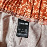 SheIn Orange and White Floral Tie Asymmetrical Hem Skirt Photo 9