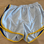 Nike  Dri-FIT running shorts blue
Yellow women’s size large Photo 0