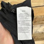 Madewell  Wrap Front Smock Waist Jumpsuit in Dot Jacquard Size Small Black Photo 11