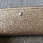Kate Spade Full Size Gold Glitter Zippered Wallet. Photo 2