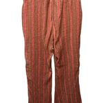 Free People  Fine Line Flare Leg Pant in Rust Combo Size Medium Boho Women's Photo 1