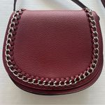 Black Rivet Saddle crossbody bag with silver chain link Photo 1
