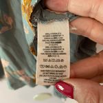 Free People  So Fine Smocked Blue Floral Butterfly Flowy Blouse Women size Medium Photo 10