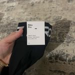 Nike  Black Mid Rise Crop Mesh Panel Leggings Size XS Photo 4