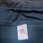 Tropical Escape  women’s black swim shorts size 10. Photo 1