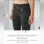 Lululemon  butterfly and striped Olive green and black leggings size 4 Photo 7