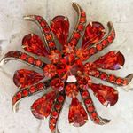 Unsigned Crimson red rhinestone starburst glimmer and shine brooch Red Photo 0