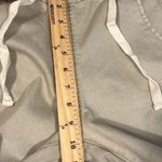 easel  small tan drawstring skinny pants with zipper on leg 10" rise 26.5" inseam Photo 6