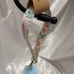 Handmade  Blue and Pink Floral Wristlet Keychain with Light Blue Pompom Photo 0