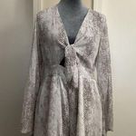 Altar'd State 🩵 Women's Snakeskin Flowy Long-Sleeved Romper Jumper Photo 0