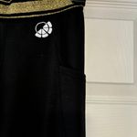 MOVI black leggings with gold waist band Photo 1