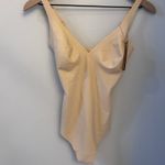 SKIMS NWT  Body Unlined Plunge Thong Bodysuit in Sand M Photo 3