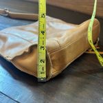 Lucky Brand  Tan Crossbody Bag with Adjustable Strap and Multiple Pockets Photo 11