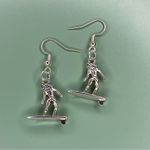 Silver Tone Surfer Girl Earrings Photo 1