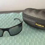 Sleek Black Sport Sunglasses with Dark Tinted Wrap Photo 3