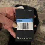 Nike NWT Black One Mid Rise Leggings Size Medium Photo 4