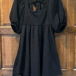 Free People  Violet Mini Dress In Black Size XS Puff Sleeve Tie Back Photo 0
