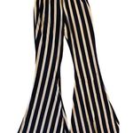 Polly & Esther Polly&Ester black yellow and white striped bell bottoms size small long Photo 0