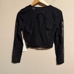 Lululemon NWT Mesh Panelled Training Long Sleeve Shirt
Black- Size 8 Photo 5