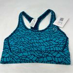 Moving Comfort  Switch it up Racer sports bra in Azure woven size S Small NWT Photo 0