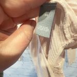 Aerie  Long Sleeve Bodysuit snap closure, ribbed, oatmeal color. Size Medium Photo 3