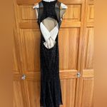 Faviana  Mesh Black Sequin Prom Gown Photo 5