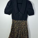 We Wore What Revolve  Black and Ditsy Daisy Romper Size XS Photo 1