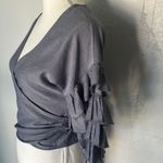 Haute Monde Ruffle Wrap Blouse — Bold Sleeves, Luxe Texture. Photo 2