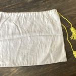 Kendra Scott Cream Dust Bag with Yellow Tassels Photo 1