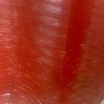 Jessica McClintock  Red shimmery scarf. Photo 1