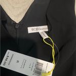 BCBGeneration  Elegant Black V-Neck Romper Photo 1