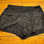 Athleta  Black Floral Print Running Shorts Women's Medium Athletic Workout Gym Photo 0