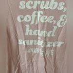 Nurse pink shirt size small Photo 1