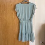 Light mint/teal short flowy dress with dainty sleeves. Blue Photo 2