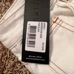 LIONESS White  denim cargo pants with a relaxed fit. New with tags #cargopants #trendy #cute #summer #style Photo 2