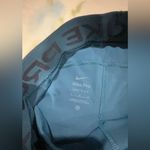 Nike Pro Teal and Orange Shorts Photo 3