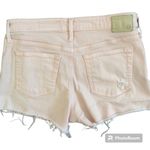 AG Adriano Goldschmied  pale pink denim cut off shorts size 28 Photo 1