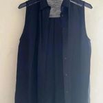 Alice + Olivia  cut sleeve tunic whit mesh details on the back color black size4 Photo 2