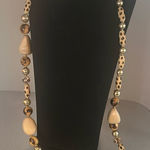 Joan Rivers  gorgeous animal print necklace. The beads are wooden.​ Photo 0