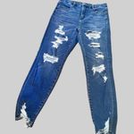 American Eagle  Ultra High-Rise Super Skinny Ripped Denim Blue Jeans Photo 0