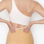 Victoria's Secret Victoria’s Secret White & Gold Color Block One Piece Swimsuit Photo 2