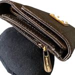 Michael Kors Brown Logo wallet, id section, card slots, back zip compartment, snap front closure, classic brown logo wallet, excellent condition, measures 8x4 inches when closed Photo 9