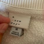 A New Day White Sweatshirt Photo 4