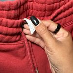 Red Joggers with Bold Yellow Logo Size L Photo 4