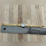 Citizen Eco-Drive Ladies Watch Crystals Pearl Dial Gold Tone Bracelet Solar Photo 9