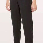 Lululemon  On The Fly Jogger Size 2 Black Athletic Pants 29” Travel Woven W5BZDS Photo 0