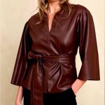 Banana Republic Bordeaux vegan leather top. Pull on. Self tie belt. Size S. NWT. Photo 0