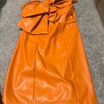 Glam  orange Leather Bow Dress size small Photo 5