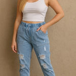 Unlisted Women’s distressed denim joggers size small Photo 0