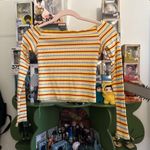 yellow, red, and grey striped off Photo 0